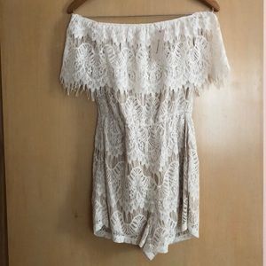 White lace off the shoulder romper. New with tags.
